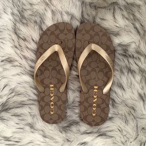 Coach flip flops, new without tags/packaging.